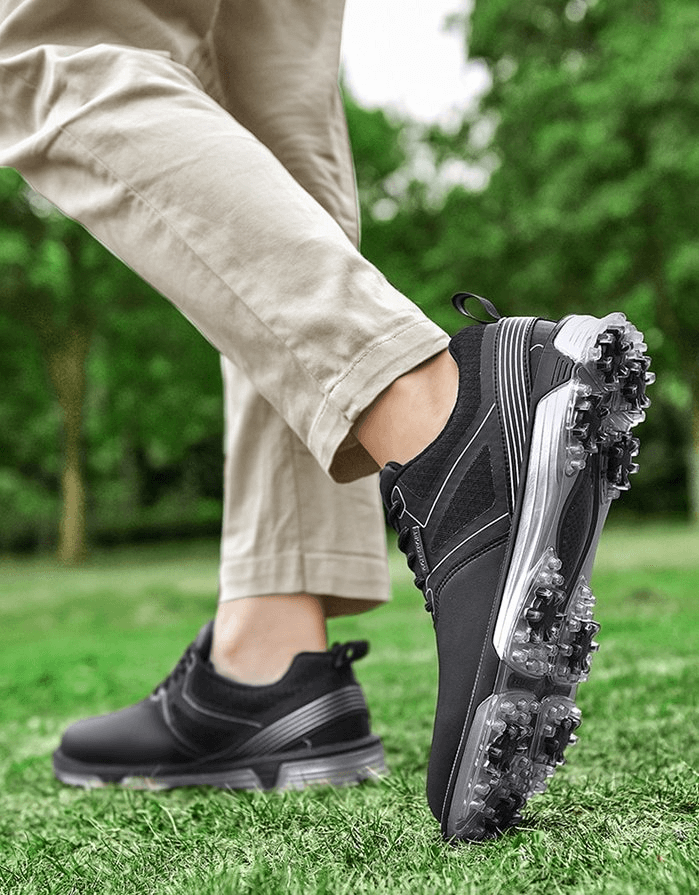 Man wearing sports flexible non-slip men's sneakers, SF1175, with durable PU upper and rubber outsole on grass.